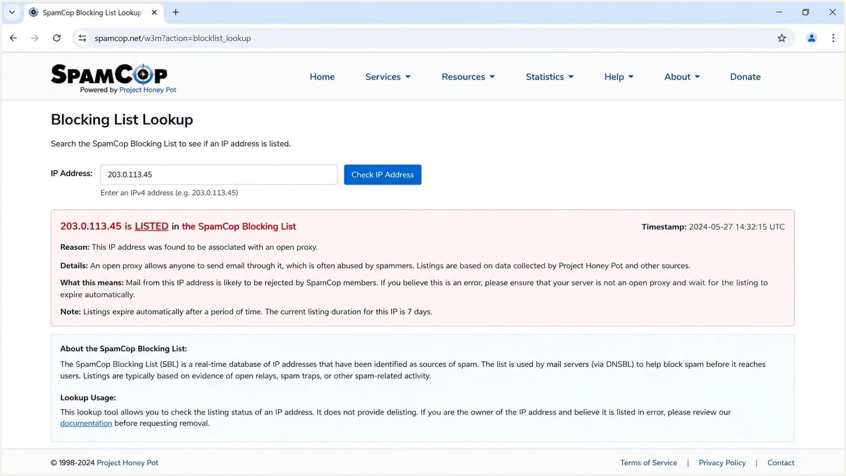 SpamCop lookup screen showing an IP listing status.