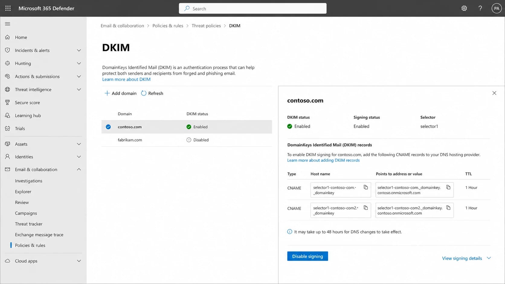 Microsoft 365 Defender DKIM setup screen showing domain status and CNAME records.